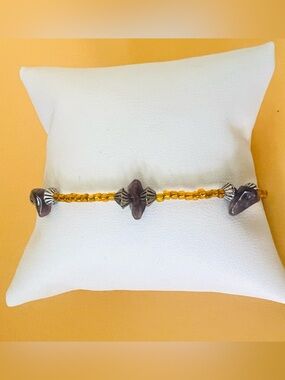 Elegant Gold and Amethyst Beaded Bracelet